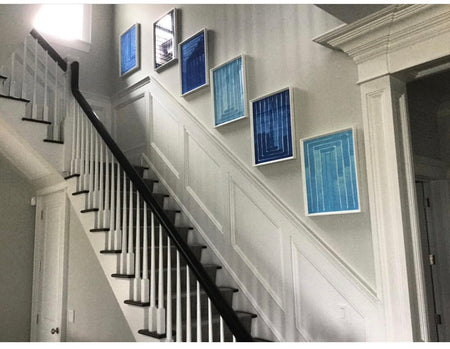 Stairway with artwork Blue and white Prints Hamptons Style