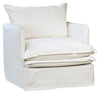 white slip covered armchair with double pillow seat