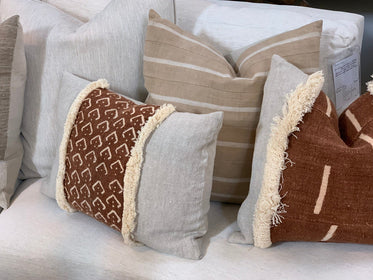 Ructic Pillows with fringing, on linen ground