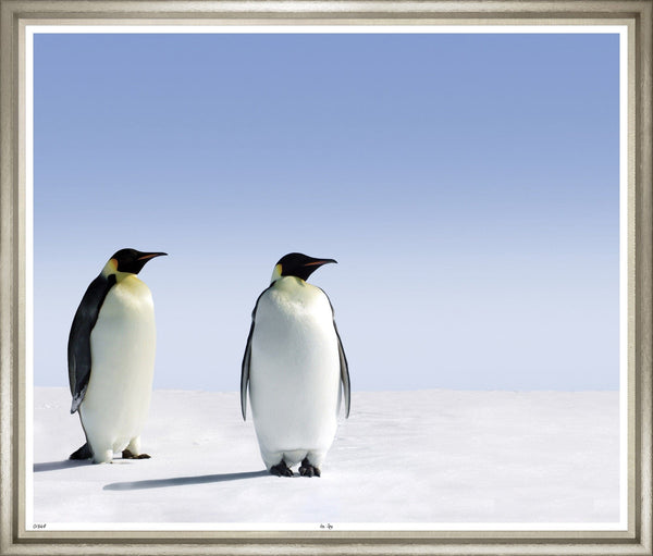 Large photograph of two majestic emperor penguins